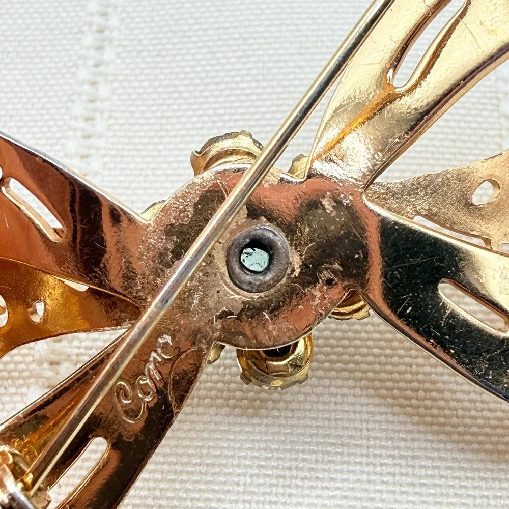 Vintage CORO Gray and Blue Rhinestones Gold Tone Cutout Bow Pin Brooch